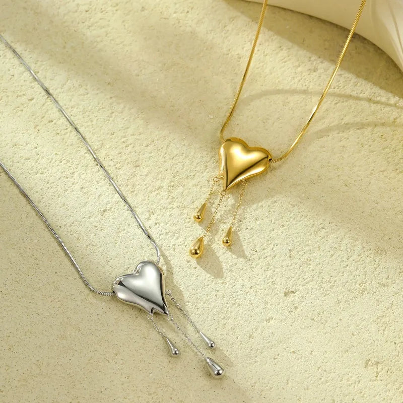 18K Gold-Plated Heart Tassel Necklace worn to showcase its length and pendant detail