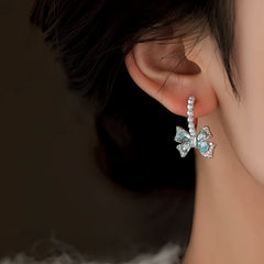 Close-up detail of the sparkling zircons and plating on the Pearl Earrings