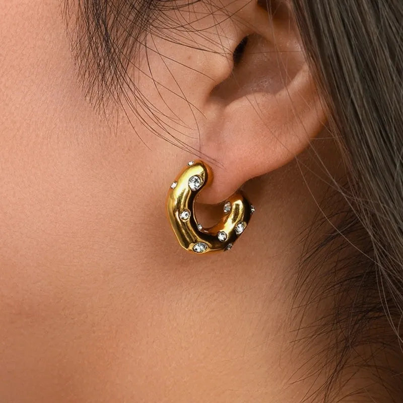 Model showcasing the dangle and style of the 18K Gold-Plated Zircon C-Shaped Earrings