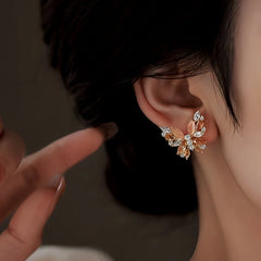 Close-up detail of the sparkling zircons and plating on the Butterfly Earrings