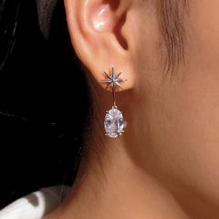 Angled view of the 18K Gold-Plated Zircon Star Earrings