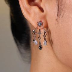 Silver CZ Star Stud Dangle Earrings with Starburst Teardrop Drops, Worn on Ear