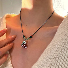 Close-up of the pendant and clasp on the Sweater Necklace