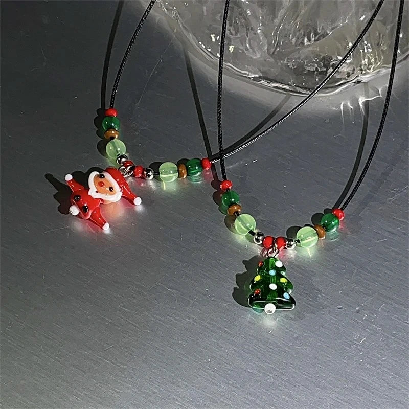 Detailed view of the Christmas Gingerbread Man Christmas Tree Socks Leather Rope Sweater Necklace chain and pendant
