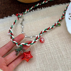 Christmas Red Star Braided Necklace worn to showcase its length and pendant detail