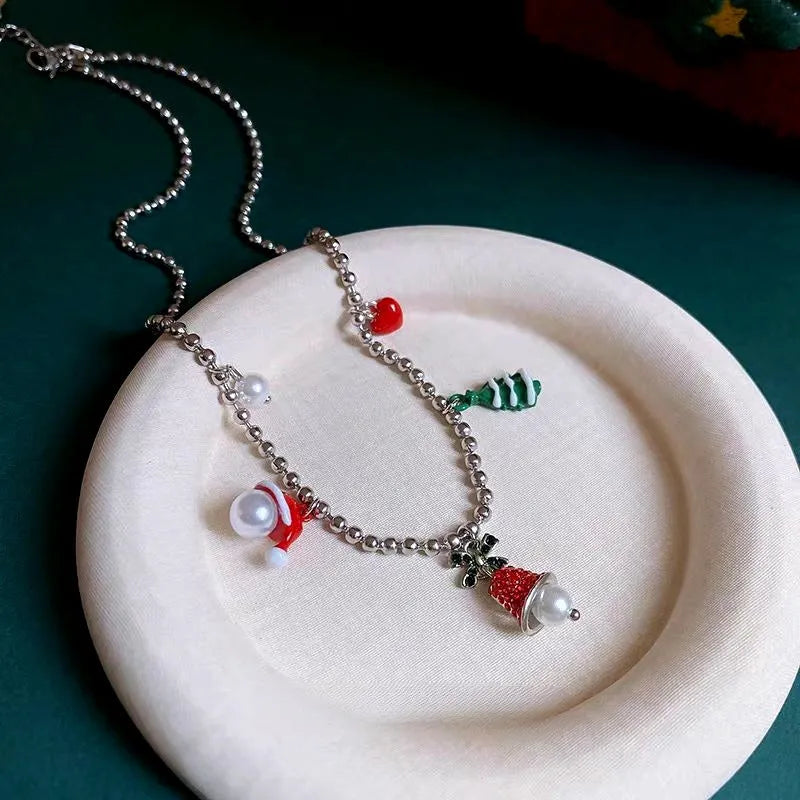 Detailed view of the Christmas Series Christmas Tree Santa Claus and Bell Necklace chain and pendant