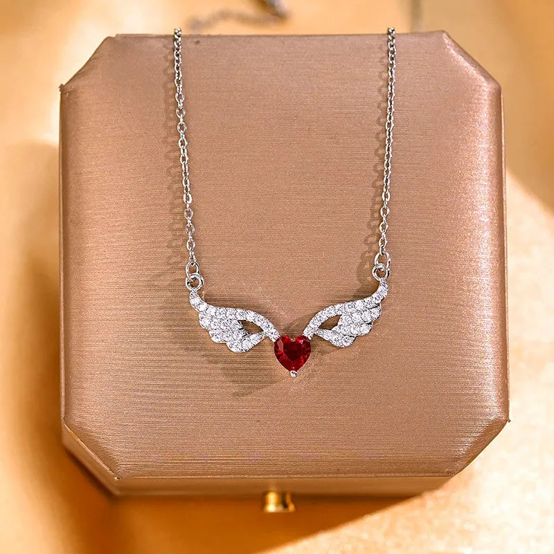 Diamond Heart Angel Wing Necklace worn to showcase its length and pendant detail