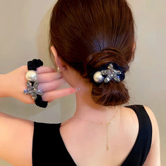 Close-up showing the material and craftsmanship of the Pearl Hairband