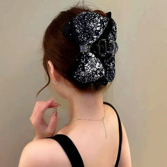 Close-up showing the material and craftsmanship of the Floral Hair Clips