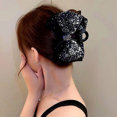 Angled view of the stylish Elegant Bow Floral Hair Clips