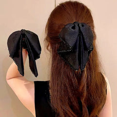 Close-up showing the material and craftsmanship of the Bow Hair Band
