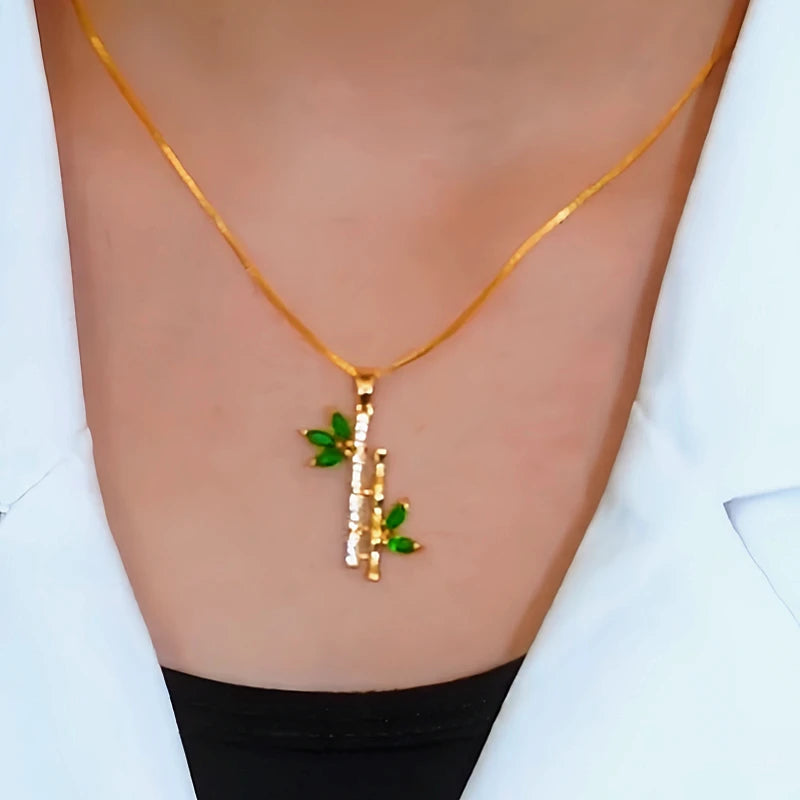 Sterling Silver Zircon Green Peace Bamboo Necklace worn to showcase its length and pendant detail