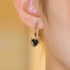 Close-up detail of the sparkling zircons and plating on the Halloween Flower Earrings