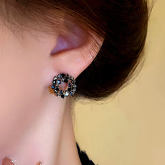 Close-up detail of the sparkling zircons and plating on the Black Diamond Hoops