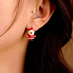 Model showcasing the dangle and style of the Silver Post Christmas Asymmetrical Santa Claus Bell Earrings