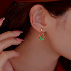 Close-up detail of the sparkling zircons and plating on the Asymmetrical Christmas Earrings