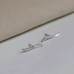 Close-up detail of the sparkling zircons and plating on the Zircon Arc Studs