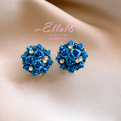 Angled view of the Silver Post Zircon Diamond Flower Stud Earrings