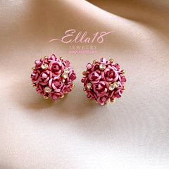 Close-up detail of the sparkling zircons and plating on the Flower Stud Earrings