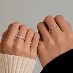 Close-up view of the gemstone and setting of the Couple Rings