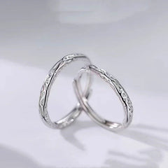 Sterling Silver Adjustable Candy Paper Couple Rings worn on the hand to show its beautiful fit and design