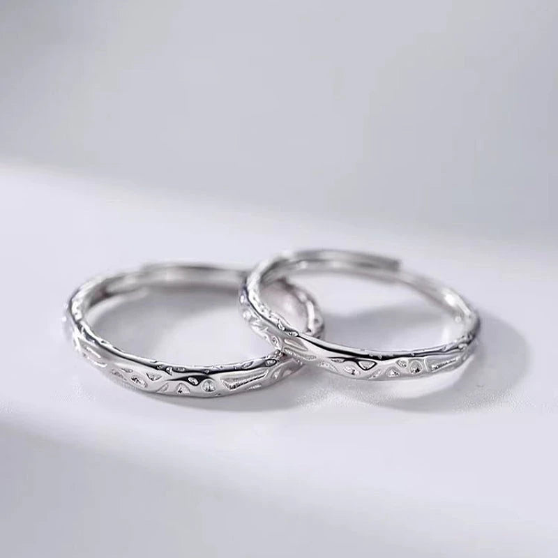Top-down view of the sparkling Sterling Silver Adjustable Candy Paper Couple Rings