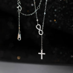 Close-up of the pendant and clasp on the Diamond Cross Necklace