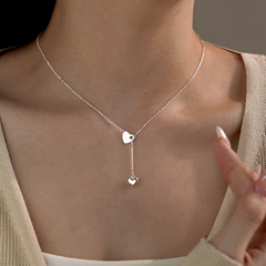 Close-up of the pendant and clasp on the Adjustable Heart Necklace