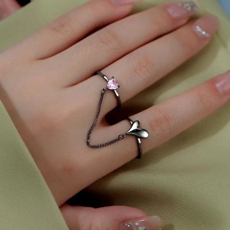 Sterling Silver Adjustable Pink Diamond Love Rings worn on the hand to show its beautiful fit and design