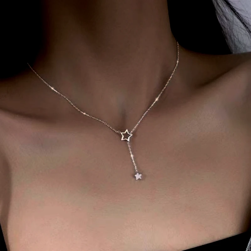 Close-up of the pendant and clasp on the Star Tassel Necklace