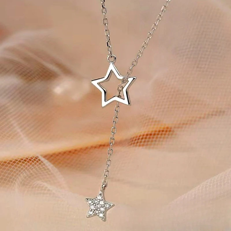 Sterling Silver Adjustable Star Tassel Necklace worn to showcase its length and pendant detail