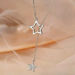 Sterling Silver Adjustable Star Tassel Necklace worn to showcase its length and pendant detail