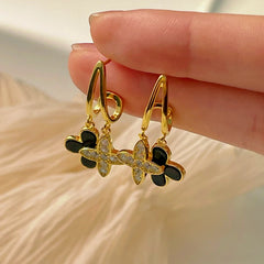 Angled view of the Sterling Silver Agate Four-Leaf Clover Earrings