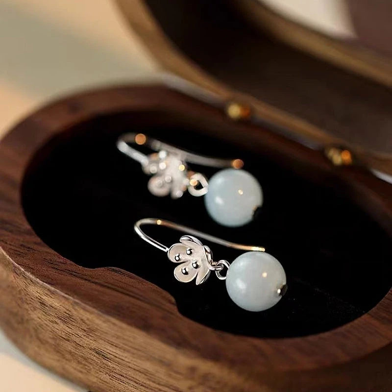 Angled view of the Sterling Silver Amazonite Flower Earrings