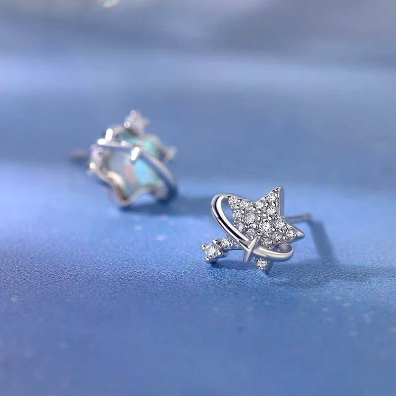 Angled view of the Sterling Silver Asymmetrical Star Earrings