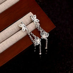 Close-up detail of the sparkling zircons and plating on the Butterfly Tassel Earrings