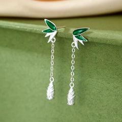 Close-up detail of the sparkling zircons and plating on the Bamboo Tassel Earrings