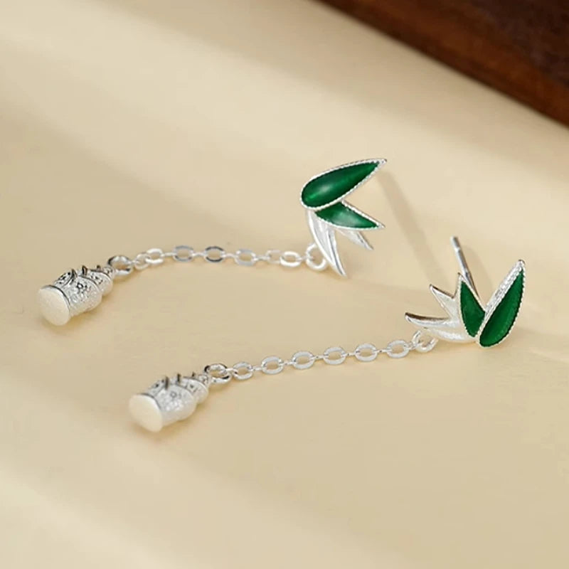 Angled view of the Sterling Silver Bamboo Shoots Tassel Earrings