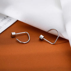 Styling the Bean Ear Hooks for a chic and modern look