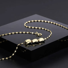 Detailed view of the Sterling Silver Bean Necklace chain and pendant