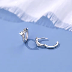 Angled view of the Sterling Silver Bling Star Hoop Earrings