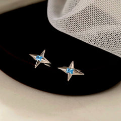 Angled view of the Sterling Silver Blue Zircon Star Ear Hook Earrings