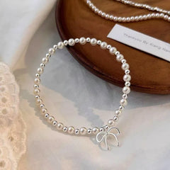 Full view of the elegant Sterling Silver Bow Pearl Bracelet
