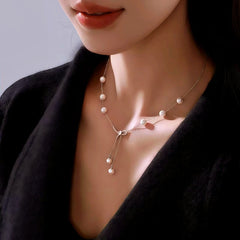 Close-up of the pendant and clasp on the Pearl Tassel Necklace