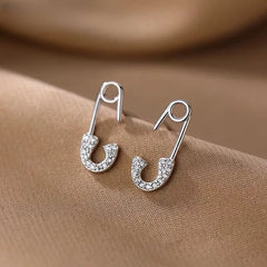 Angled view of the Sterling Silver Buckle Stud Earrings