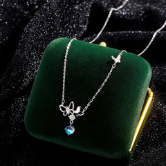 Detailed view of the Sterling Silver Butterfly Moonstone Tassel Necklace chain and pendant