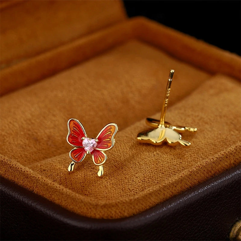 Angled view of the Sterling Silver Butterfly Stud Earrings