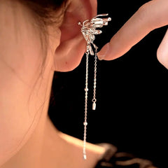 Model showcasing the dangle and style of the Sterling Silver Butterfly Tassel Ear Clips
