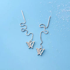 Close-up detail of the sparkling zircons and plating on the Butterfly Threader Earrings