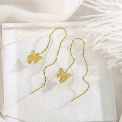 Angled view of the Sterling Silver Butterfly Threader Earrings